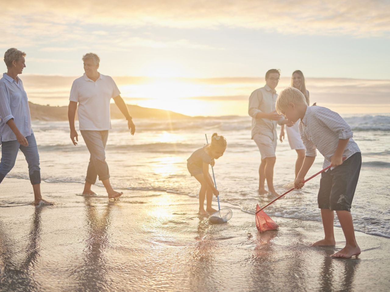 family members on a beach