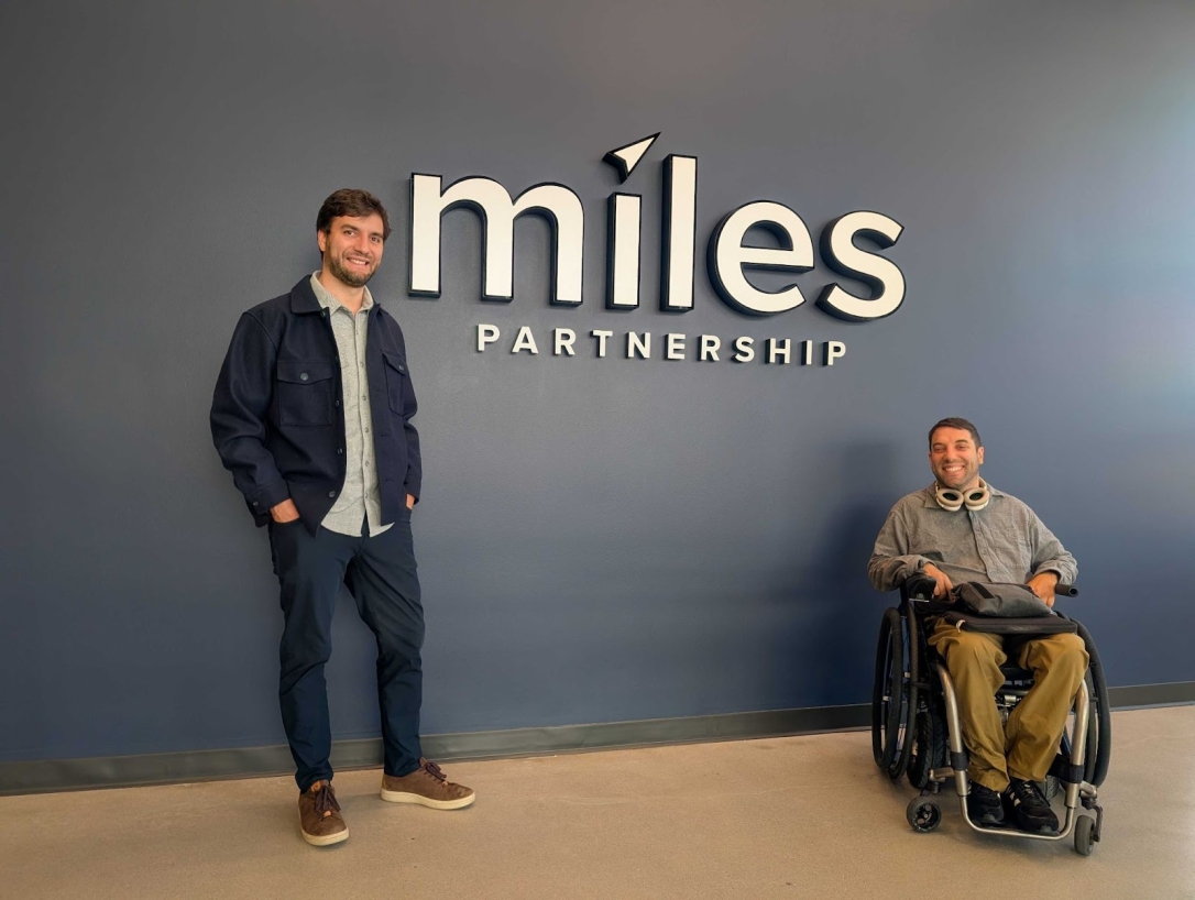 A photo of Camilo and Alvaro from Wheel the World at the Miles office. 