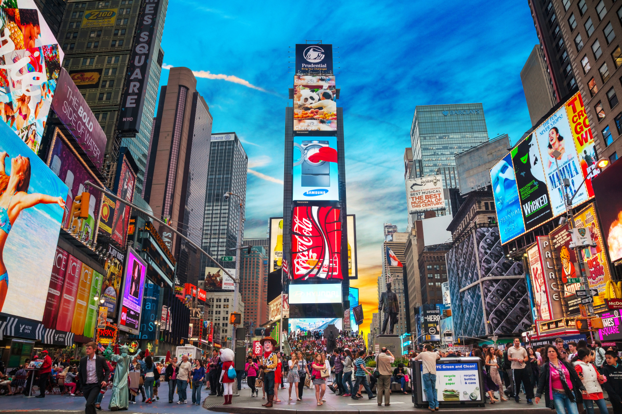 A low angle shot of Times Square. 