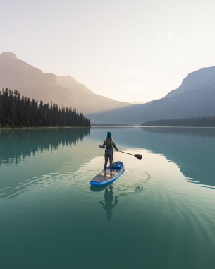 Person kayaking in lake