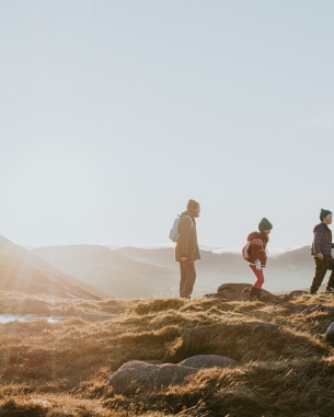 A photo of a family hiking