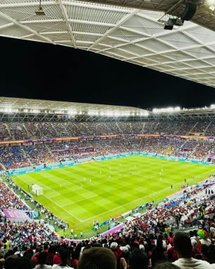 A wide shot of a soccer stadium.