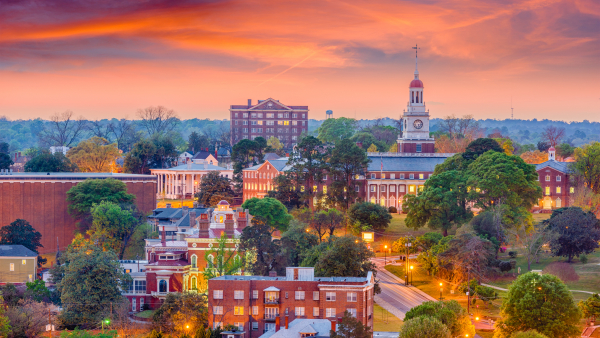 A skyline photo of Macon, Georgia at sunset.