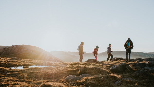 A photo of a family hiking