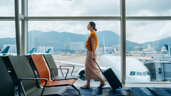 A photo of a traveler in an airport. 