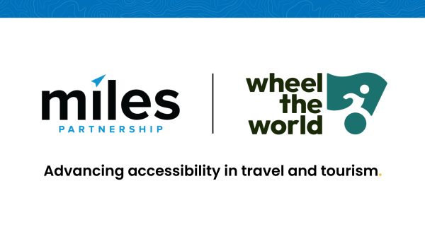 A logo of Miles x Wheel the World