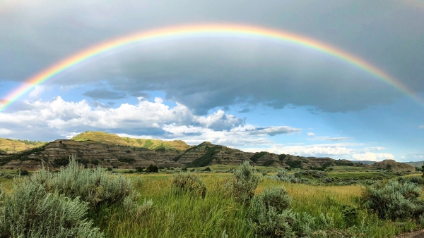 A photo of a rainbow over the Medora plains in North Dakota.