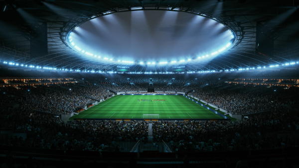 An aerial photo of a fan-filled soccer stadium. 