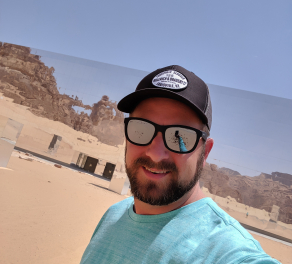 Neal Alfano in a desert landscape in Saudi Arabia