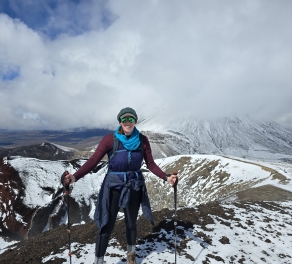 A photo of Roxanne hiking in New Zealand.