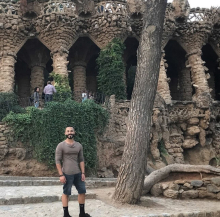 Juan Vargas next to a tree