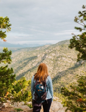 person looking at mountain view