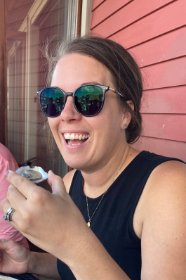 Ally Drees with oyster in her hand