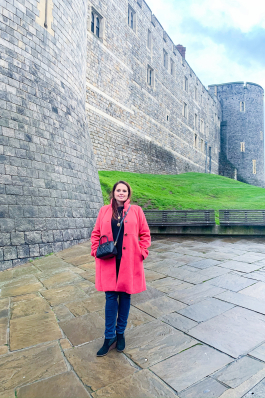 Angela Vaughn standing in front of castle walls
