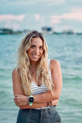 Britt Mattie portrait in front of the ocean in Sarasota