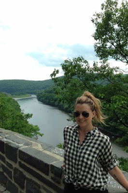 Carrie Rodgers in front of a river in upstate New York