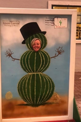 Claire Wingate poses as a cactus snowman in a photo stand-in at the Grand Canyon Railway & Hotel