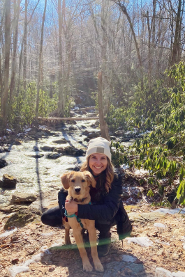 Courtney Spiess hiking with her dog in Boone, NC