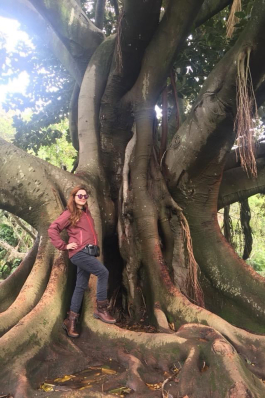 Dana Behnfield with a very large tree in Portugal