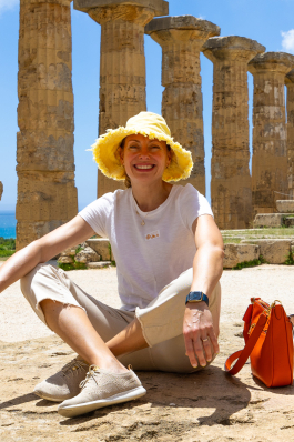 Elena Prostova among historical ruins in Sicily