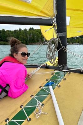 Ivy Vaughn on a day-sailing catamaran in Michigan