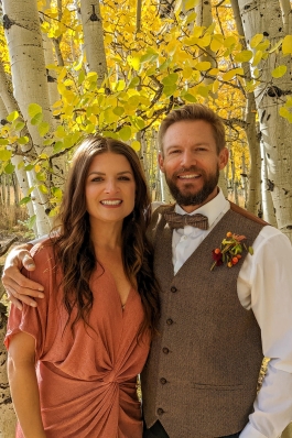 Kelli Chiri among aspen trees showing off their fall colors in Colorado