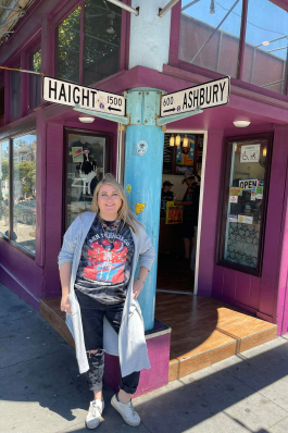Kiki Mannear at the Haight-Ashbury intersection in San Francisco