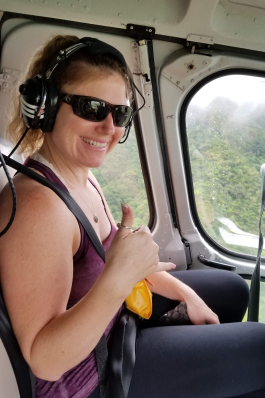 Lauryn Peterson in a helicopter in Hawai'i