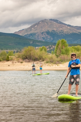 Pat Attkisson paddle boarding in Colorado