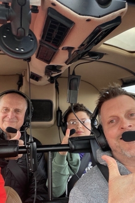 Ryan Thompson in a helicopter