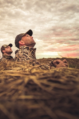 Jay Salyers in a field in camo