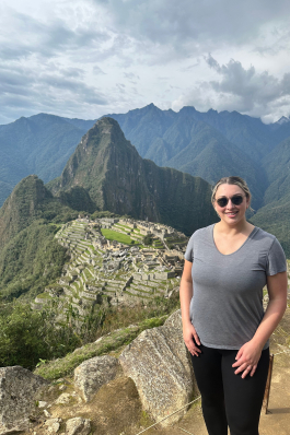 Ashley Hughes in front of Machu Picchu