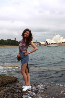 A photo of Wenjie in Sydney with the Opera house as a backdrop. 