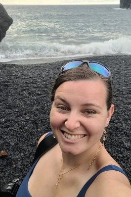 A photo of Emily on a beach in Hawaii. 