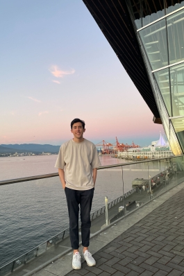 A photo of James near a walkway in Vancouver. 