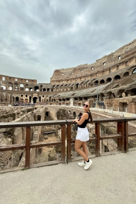A photo of Jada overlooking the coliseum in Rome.  
