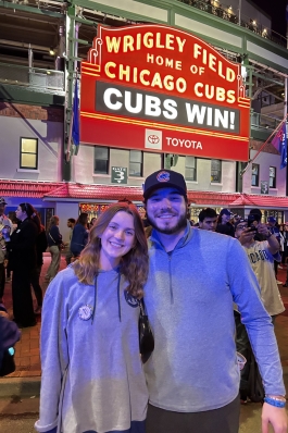 A photo of Taylor outside Wrigley Field