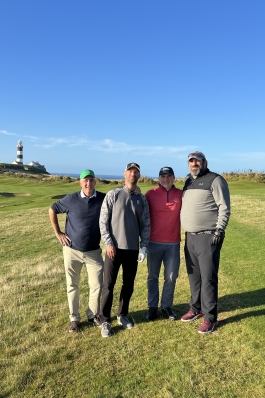 A photo of Joe golfing. 