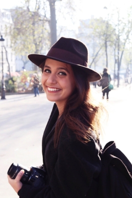 A photo of Tiffany and her camera in Paris. 