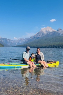 A photo of Emily on a canoe at Glacier National Park. 
