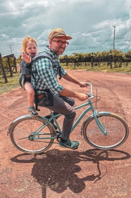 A photo of Gordy on a bike.
