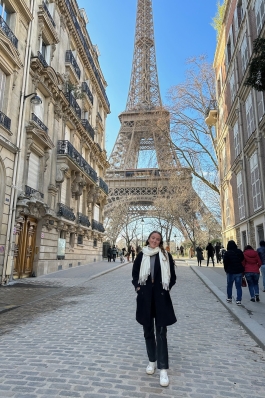 Meg posing near the Eiffel Tower