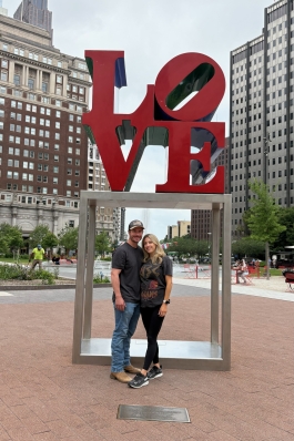 Trisha and her partner next to the iconic LOVE statue in Philly. 