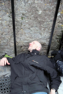 Vance laying on a rock in Ireland. 