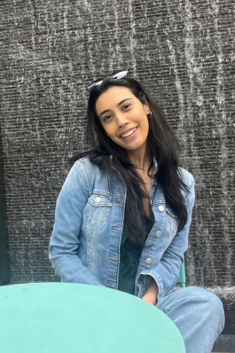 Minhal smiling at the camera while visiting Nashville. 