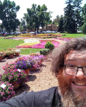 Adam Storm in a flowery garden