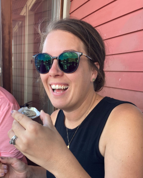 Ally Drees with oyster in her hand