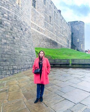 Angela Vaughn standing in front of castle walls