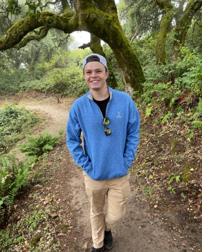 August Erickson walks down a trail in Palo Alto, CA