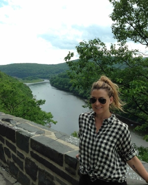 Carrie Rodgers in front of a river in upstate New York